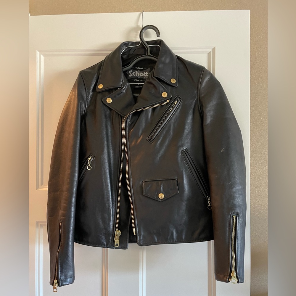 Black leather moto jacket, size small, like new